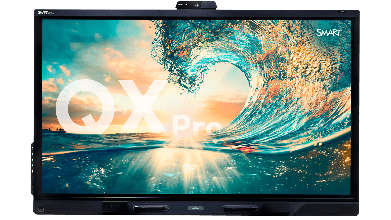 SMART Board QX Pro for business meetings, featuring a vibrant image of a cresting ocean wave under a sunset, symbolizing dynamic and powerful business solutions.